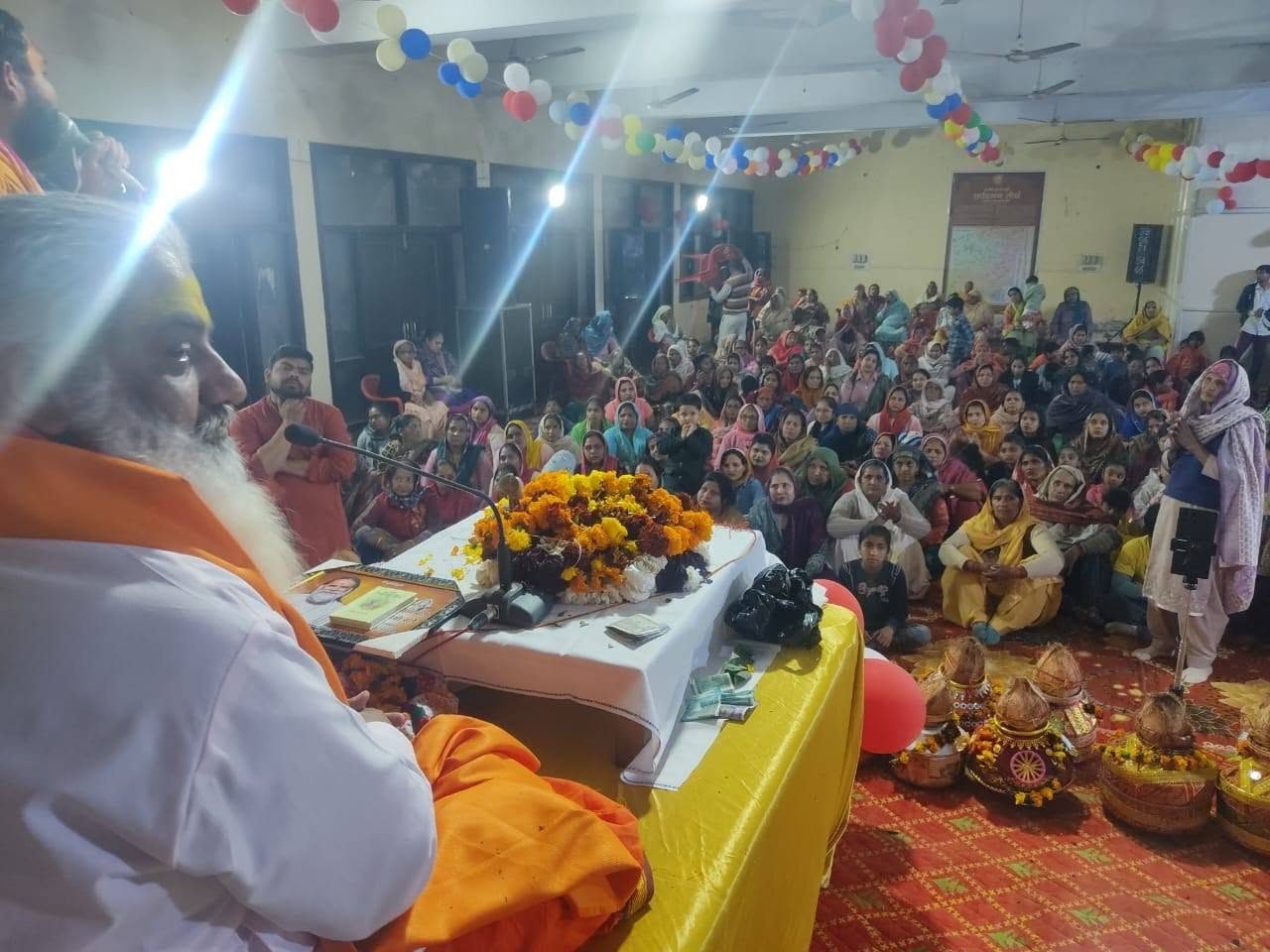 Katha programme with a large gathering of village women and children