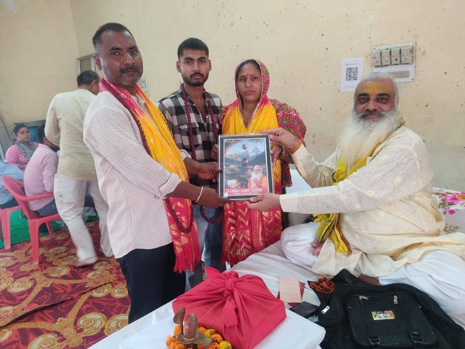 Members of the Sanstha meeting a visiting guest