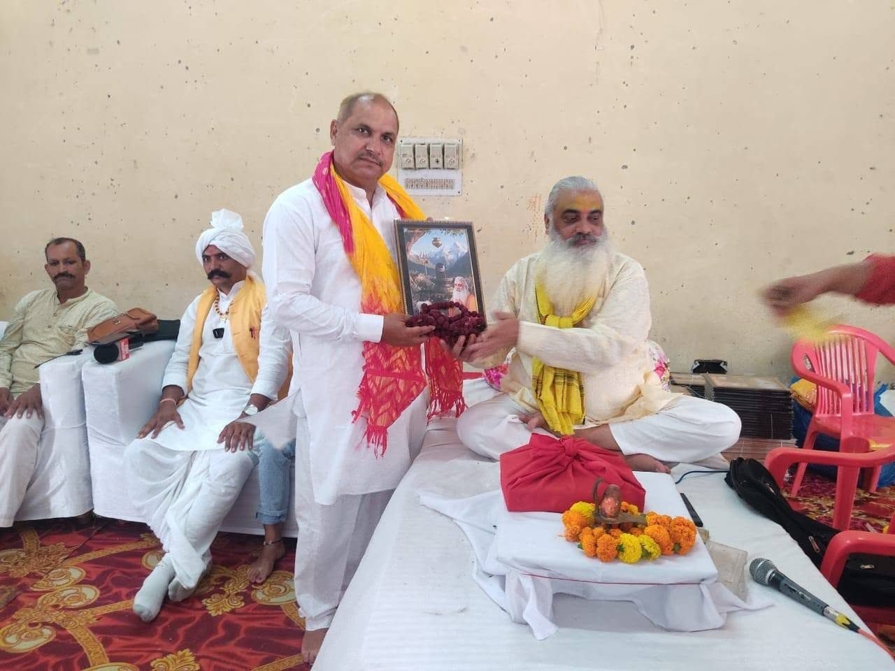 A supporter of the Sanstha being honoured at a programme