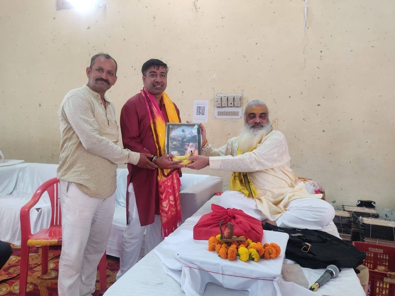 Volunteers and members honoured at a Sanstha programme